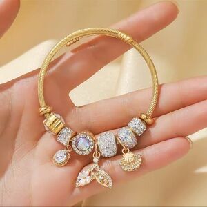 Gold Charm Sparkling Beads & Nautical Charms Bracelet